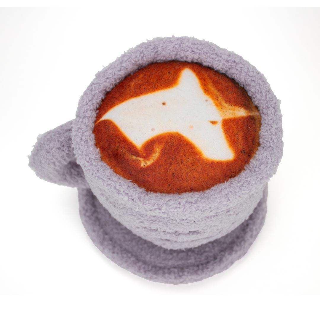 Dog Squeaky Toy with Dog-shaped latte art in a cup with a textured gray sleeve on a white background