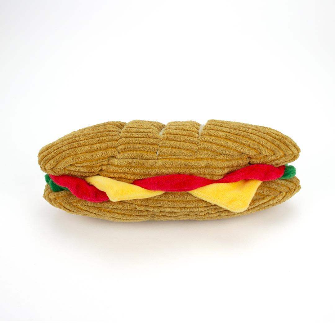 Plush interactive dog toys shaped like a sandwich on a white background