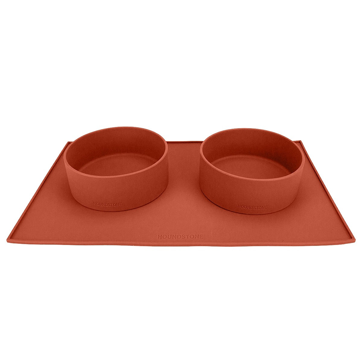 two houndstone silicone dog bowls in terracotta on a dog food mat