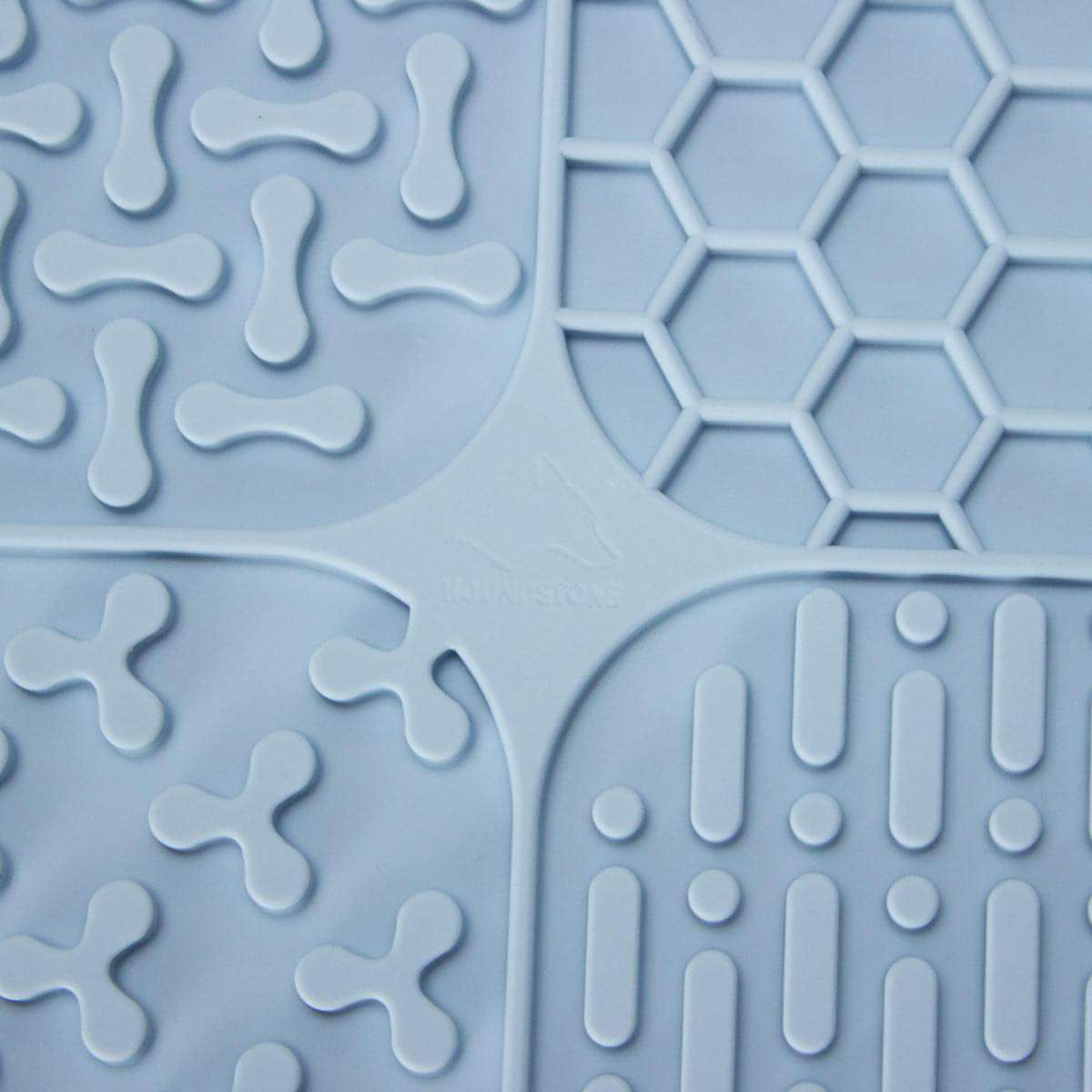 dog lick mat blue photo from close-up