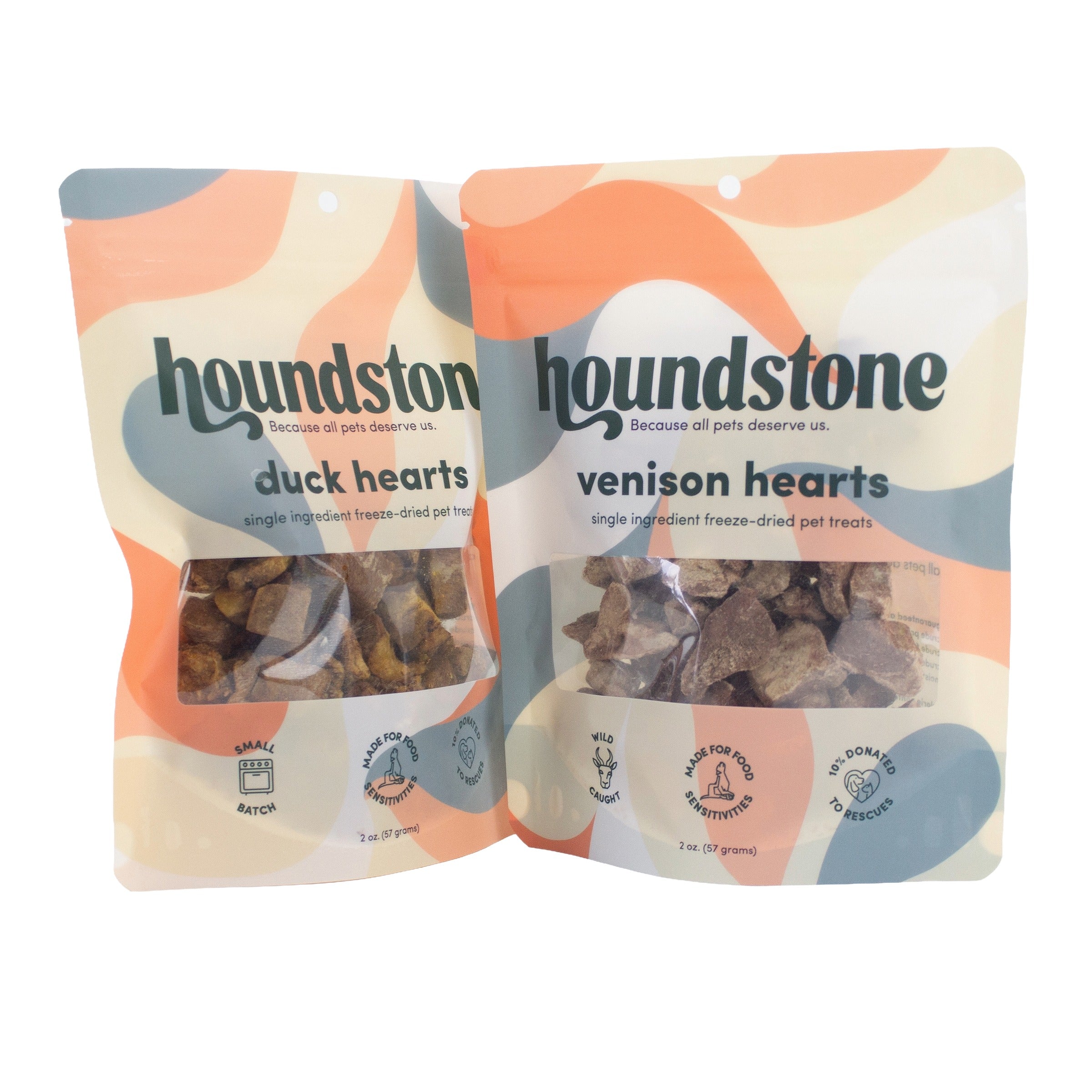 Two stand-up pouches of Houndstone cat treats on a white background. The left pouch is labeled duck hearts cat treats, and the right pouch is labeled venison hearts cat treats.