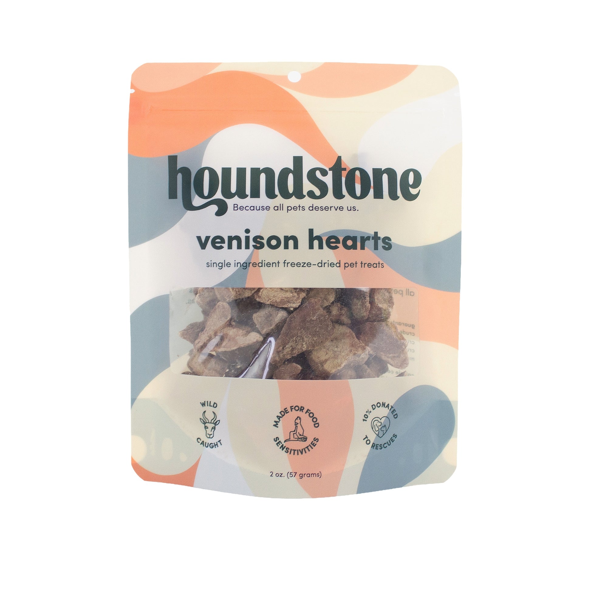 A stand-up pouch of Houndstone venison hearts freeze-dried cat treats on a plain white background. The packaging features a retro wavy pattern in peach, blue, and cream, with a clear window showing the brown freeze-dried cat treats inside.